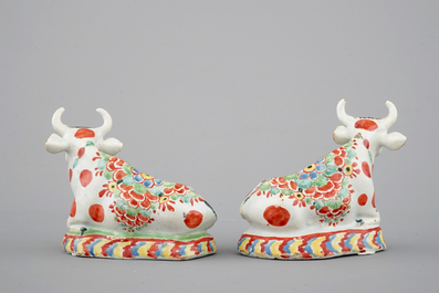 A pair of petit feu polychrome Dutch Delft cows, 18th C.